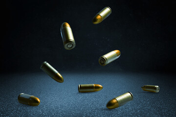 Group of golden bullets falling on asphalt ground concrete grunge floor street