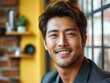 © jiawei - Asian man with a smile on his face is wearing a suit and a shirt in studio office background