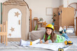 © Pixel-Shot - Cute little builder drawing plan at home