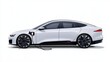 © A4719 - A sleek, white electric car is charging, showcasing modern design and sustainable technology in automotive innovation.