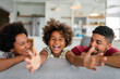 © NDABCREATIVITY - Happy african american family having fun time at home. Family people love happiness concept