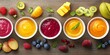 © Nijat - Various purees in bowls accompanied by fresh fruits arranged on a wooden table, captured from a flat lay perspective, showcasing the vibrant colors and textures of the purees and fruits.