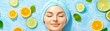 © Ndoomyim - Radiant woman with towel and fresh orange slices, a revitalizing beauty treatment