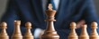 © SITTAKAN - Chess master contemplating the final move, pieces arranged for checkmate, Strategy, execution, victory, Strategic success