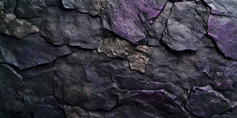 Leinwandbilder - Textured wall background featuring a dark granite stone facade, with dark and light shades creating a dynamic contrast. The dark stone texture is complemented by clear purple textured elements and