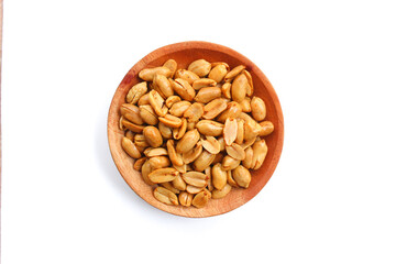 Wall Mural - Roasted salted peanut on a wooden plate isolated on white background. Top view