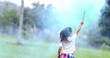© Marco - Happy child playing with color smoke bomb