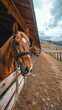 © Raphael - horses saddled up in the stables of luxury white Yellowstone ranch with views of the rolling hills and mountains