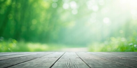 Poster - Rustic Wooden Tabletop Against a Defocused Background of Lush Green Foliage and Sunlight Filtering Through the Trees
