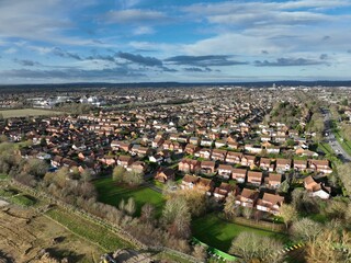 Wall Mural - Aerial view of suburban neighborhood and green spaces.