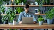 © Jardel Bassi - A businessman working on a laptop in a stylish home office with a modern desk and contemporary decor