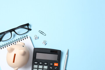 top above overhead view photo of office accessories calculator, glasses, notebook and pen on color b