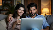 © Gokul - Happy Couple Browsing the Internet Together on Cozy Sofa