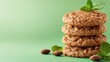 © Ilona - A stack of cookies with mint leaves on top of them
