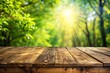 © Mostafizur - rustic wooden table with glowing sunlight and lush green bokeh forest, ideal for wallpaper background design
