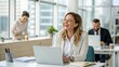 © engincan - woman working in the office receives happy news