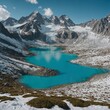 © Muhammad - A panoramic view of a turquoise alpine lake with snowy peaks in the background.