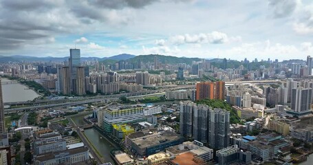 Wall Mural - Aerial shot of modern city building skyline at sunrise in Zhuhai, China