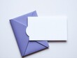 © Prayad - A flat lay of an elegant event invitation set with a folded envelope and sticker layout, celebration, card