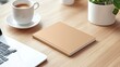 © Arti - A serene workspace featuring a soft cover notebook, a cup of coffee, and potted plants on a minimalist desk
