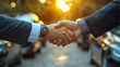 © Siasart - Successful Business Deal: Partners Shake Hands at Sunset