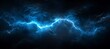© Nabil - Blue lightning strike across dark stormy clouds.
