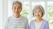 © Yuudaishin - Happy Elderly Japanese Couple Smiling in a Bright and Peaceful Home Setting