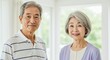 © Yuudaishin - Happy Elderly Japanese Couple Smiling in a Bright and Peaceful Home Setting