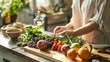 © JuanB - Person preparing fresh vegetables on a kitchen countertop