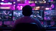 © Bayu - Gamer plays video games on multiple monitors in a brightly lit arena.