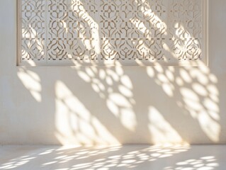 Poster - Light patterns cast by ornate screen onto a plain wall.