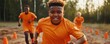 © pisan - Witness the fervor as these dedicated soccer players sprint with impressive speed through a cone-lined field during an intense training session Each athlete demonstrates raw passion, commitment, and