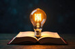 © Alena - Light bulb with book, Idea concept for innovation idea, power of knowledge, power of reading, Self-learning, education knowledge. Internet education course degree, Idea of learning online class
