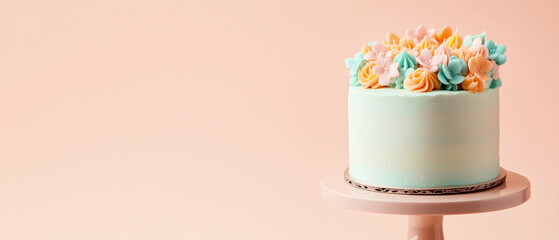 Wall Mural - Beautifully decorated pastel cake with floral frosting and copy space for text