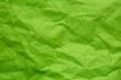 © banjongseal324 - Close-up of green crumpled paper texture,Abstract light green paper texture background. Texture of crumpled craft paper. Paper background. Recycled green paper backdrop in close up. green