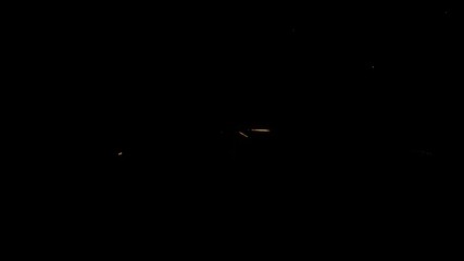 Fototapete - Vibrant display of sparks and light radiates outward in dynamic explosion effect at night