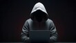 © madedee - hacker in front of his computer committing digital cybercrime