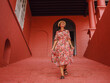 © YURII Seleznov - Young woman in ethnic dress and hat exploring the vibrant streets of Malacca, Malaysia. A blend of cultural heritage, colorful architecture, and tropical charm. Perfect travel and lifestyle moments.