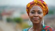 © Степан Озарчук - Middle-aged Nigerian woman with a colorful dress and a confident look.