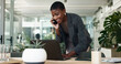 © peopleimages.com - Black woman, phone call and typing on laptop in office, schedule meeting and talking to client. Female person, communication and online for news quote by contact, press journalist and calendar notes