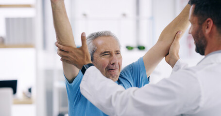 Wall Mural - Man, elderly patient and stretching with physiotherapist for physical examination, checkup or visit at clinic. Male person, medical worker or client with physiotherapy for arm flexibility at hospital