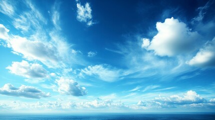 Wall Mural - Blue sky with soft focus white clouds, offering a tranquil atmosphere and ample copy space, perfect for showcasing text, logos, or promotional messages in a clean, airy layout.