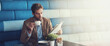 © peopleimages.com - Business, man or coffee with newspaper in cafe for stock market news, economy update or morning break. Banner, space or person reading a media print for article, story or relax with caffeine beverage