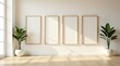 © Angel Pic - Minimalist Interior Design Mockup Four Empty Frames and Potted Plants in Sunlit Room