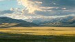 © ABIDZAR ALFAREZ - Scenic sunset over vast grassy plain and majestic mountain range.