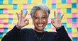 © peopleimages.com - Happy woman, portrait or approval okay with planning for creative project, review or agenda in office. Mature designer, excited or like emoji at sticky note background for OK, yes or new opportunity