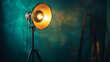 © Tahsin - Creative studio setup featuring a vintage spotlight and wooden ladder in a teal room.