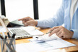 © Charlie's - Man work from home. work online on laptop. businessman working online business concept with social distancing laptop online meeting.