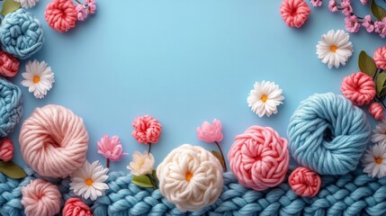 Wall Mural - Colorful yarn and flowers create a beautiful crafting display on a blue background