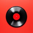 © Ms_Tali - Vinyl record on vibrant red background: retro musical nostalgia